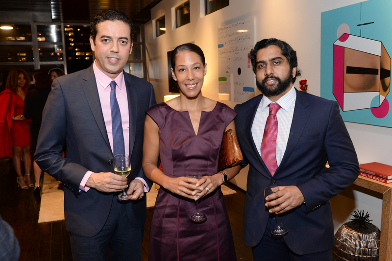 Mona Sutphen (center), with Hicham Enhaili (left) and Asanka Pathiraja, attends a gathering in New York City April 1, 2016. Andrew Toth/Getty Images for Baroque Access